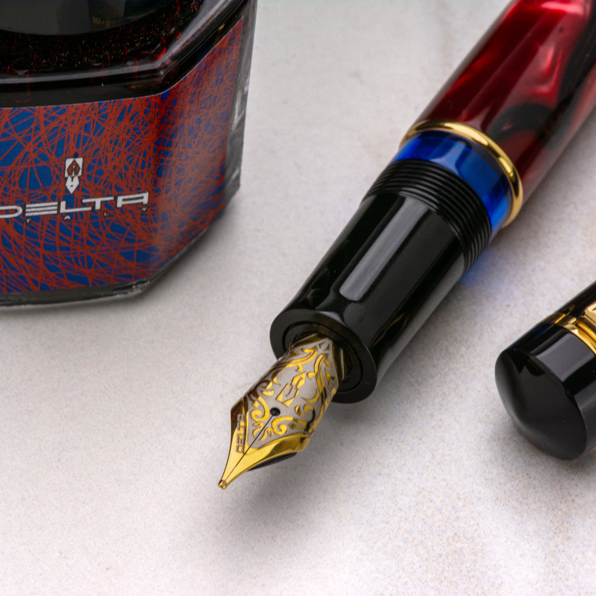 Delta Limited Edition Fountain Pen - Four Rings Crimson Night - Yellow Gold Trim - Steel Nib
