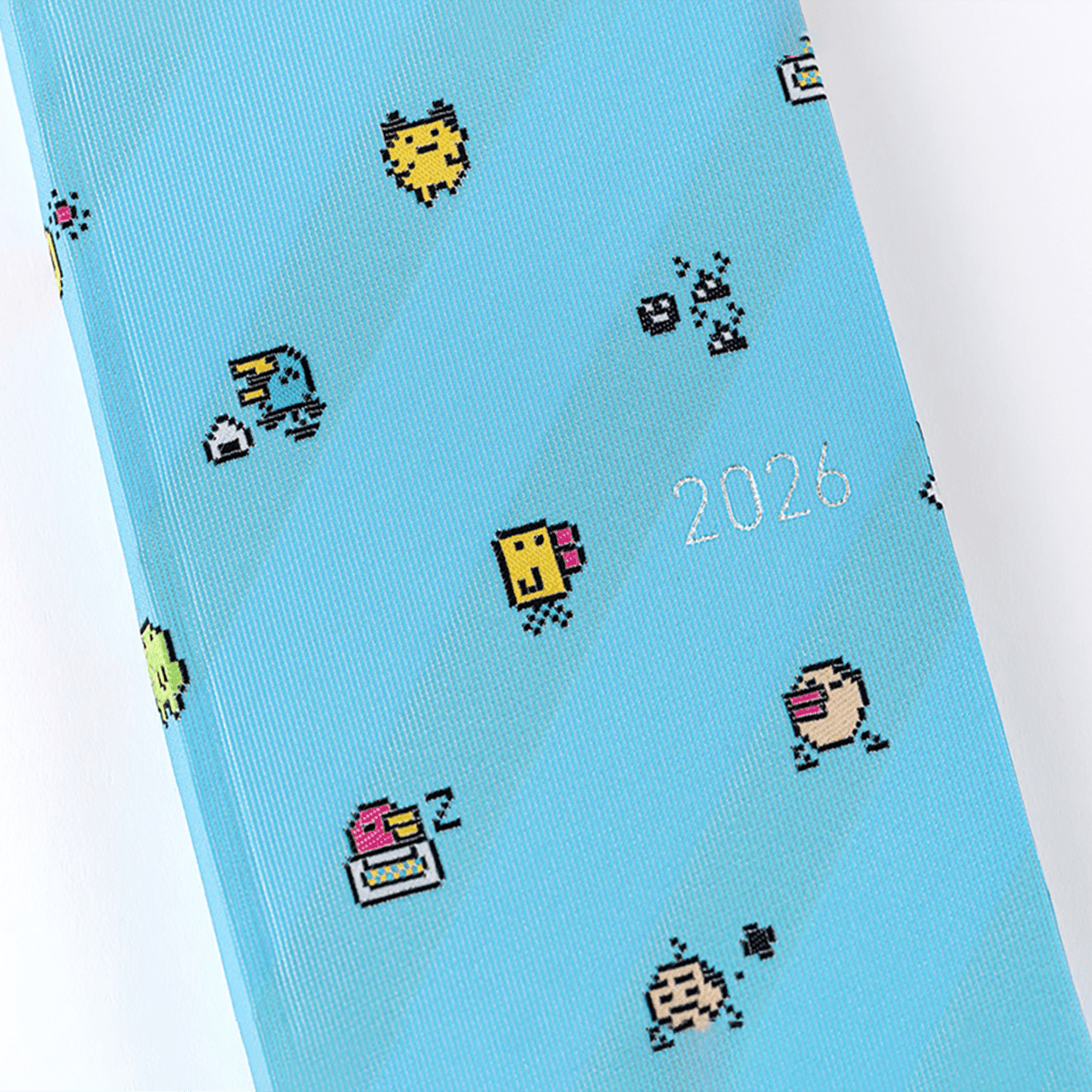 Hobonichi Light Hard Cover Japanese Book - Tamagotchi: Our Tamagotchi - Tall & Slim (Weeks - April Start) - Pen Boutique Ltd